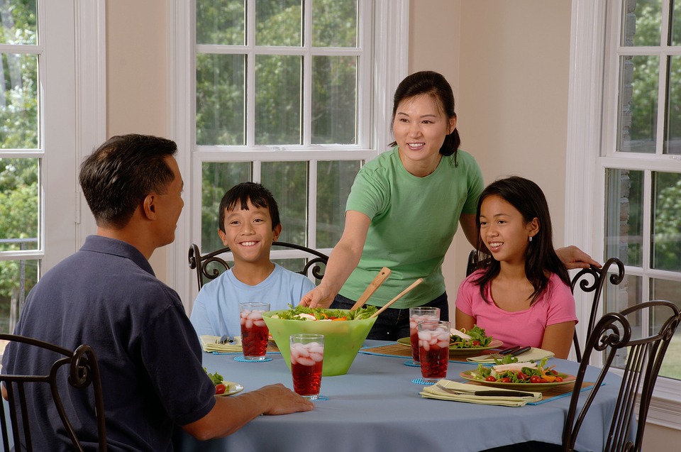 A family having dinner together.