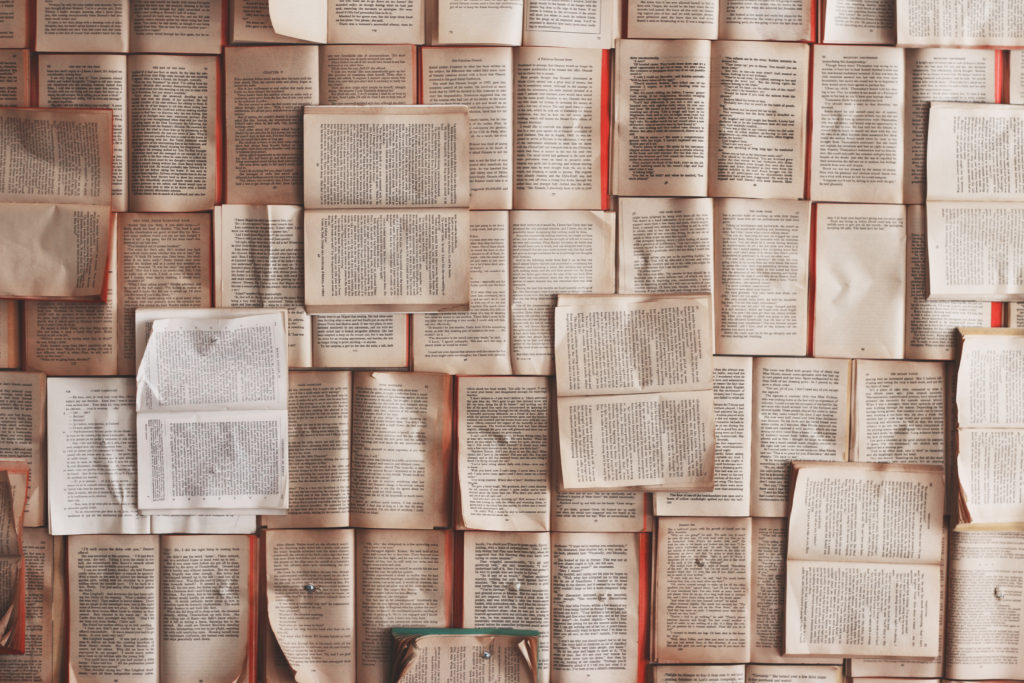 Open books laid out on table