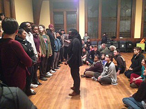 Photo of Rev Sekou training young adults