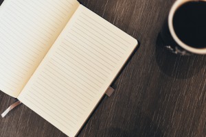 notebook and cup of coffee