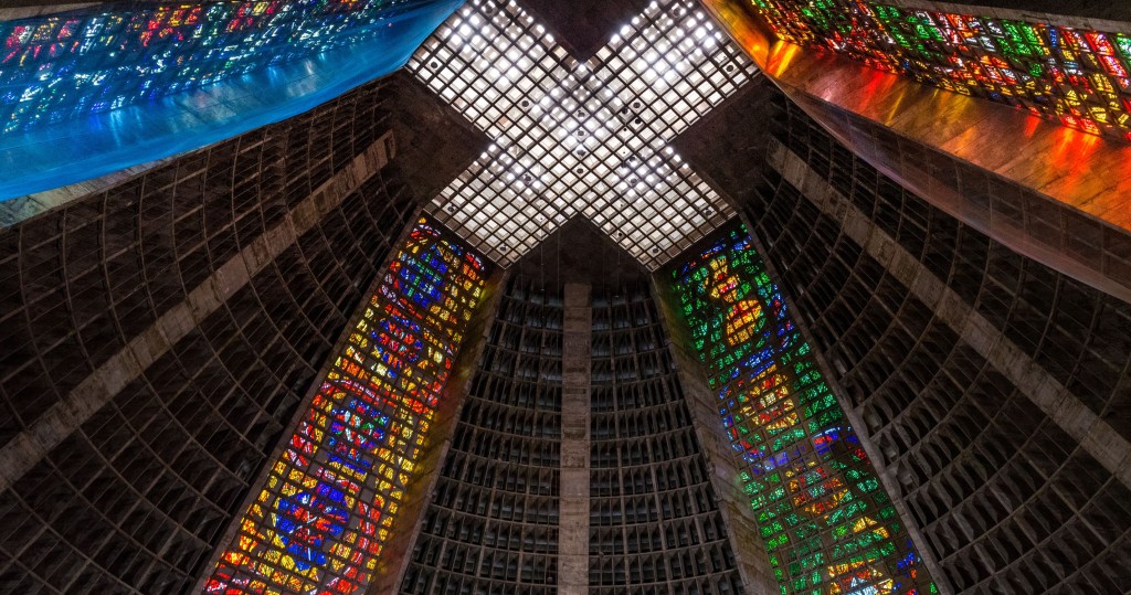 Multiple stained glass window columns in a cathedral