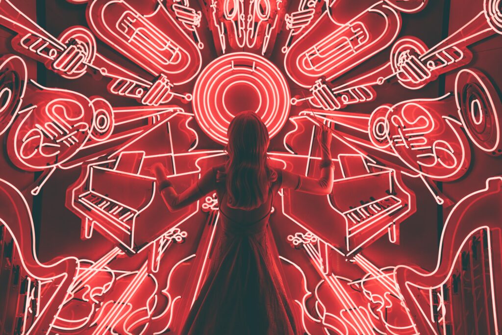 This scene shows a woman conducting madness of music around her.